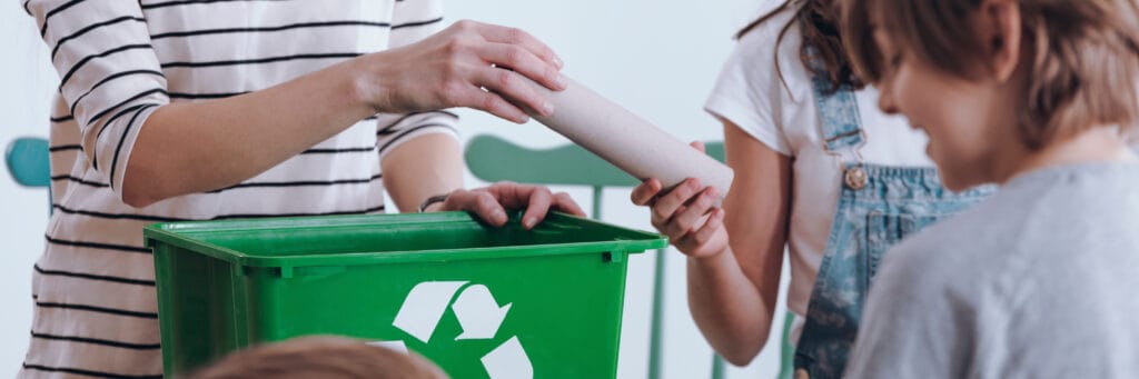 A family sorting waste
