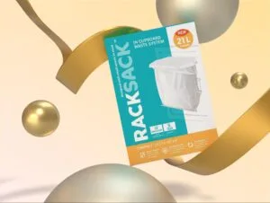 L'emballage du système de petite poubelle Rack Sack, conçu pour les placards, flotte sur un fond doré moderne, présentant une solution de gestion des déchets compacte de 21 L pour les petits espaces.